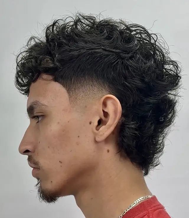 Curly mullet with burst fade by Nathan Quizon