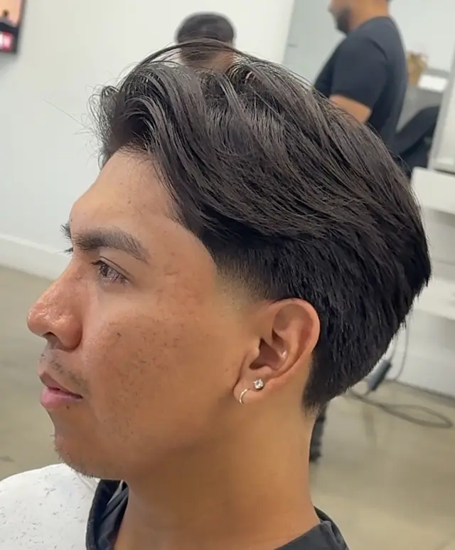 Flow haircut with low taper by Nathan Quizon