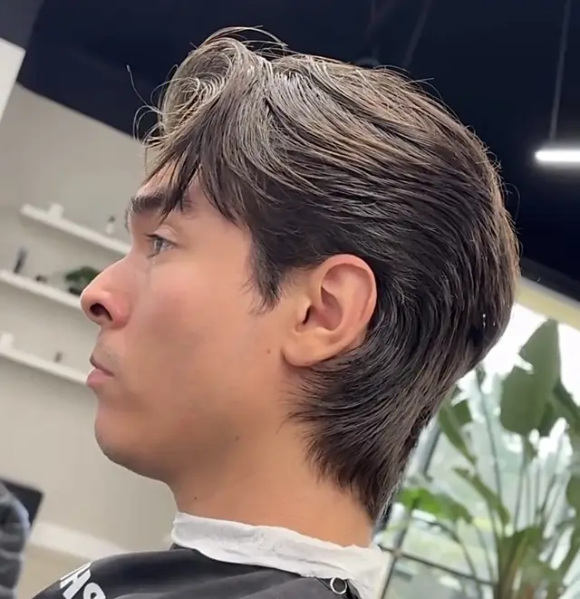 Scissor-cut flow with curtain fringe by Nathan Quizon